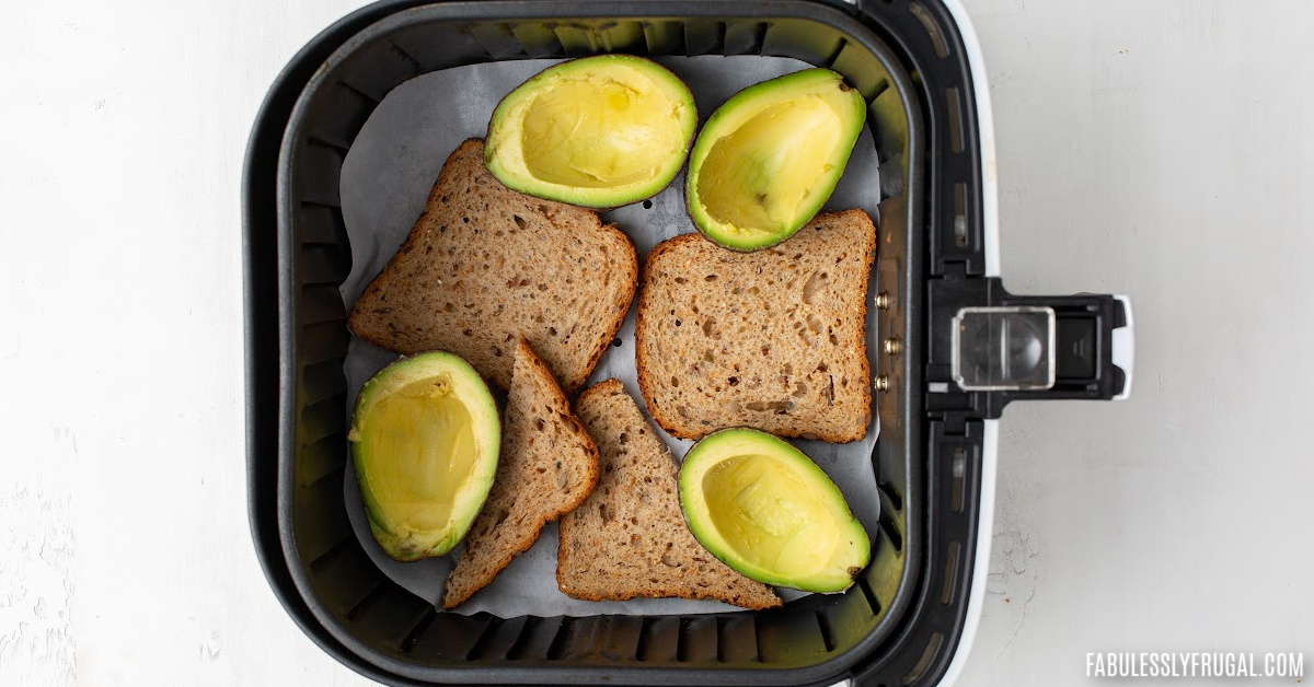 avocado and bread in air fryer basket