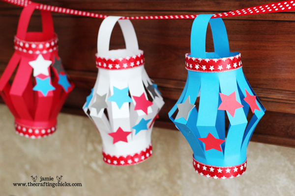 3 small paper lanterns red white and blue