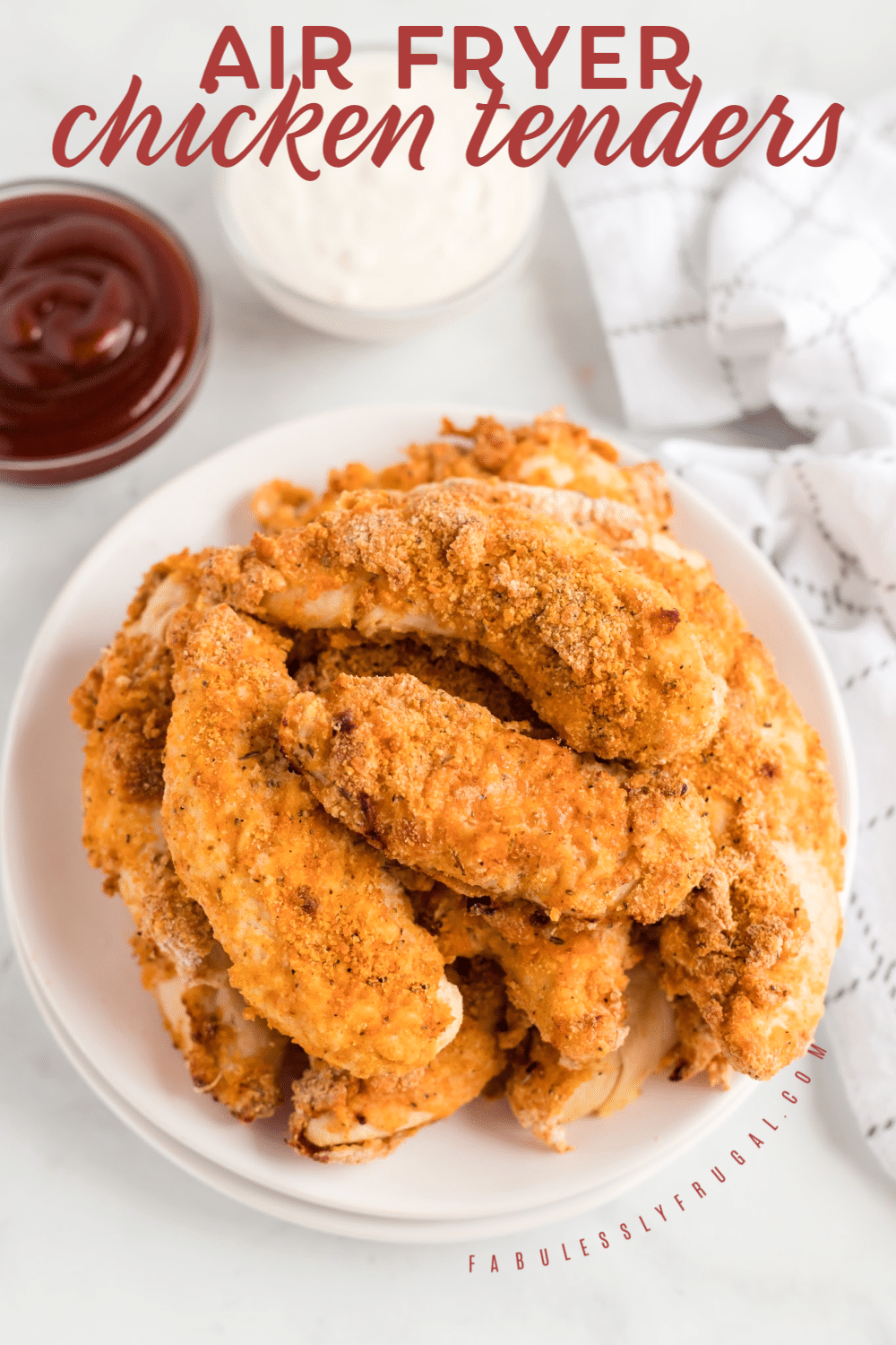 Air fried chicken tenders next to dipping sauce