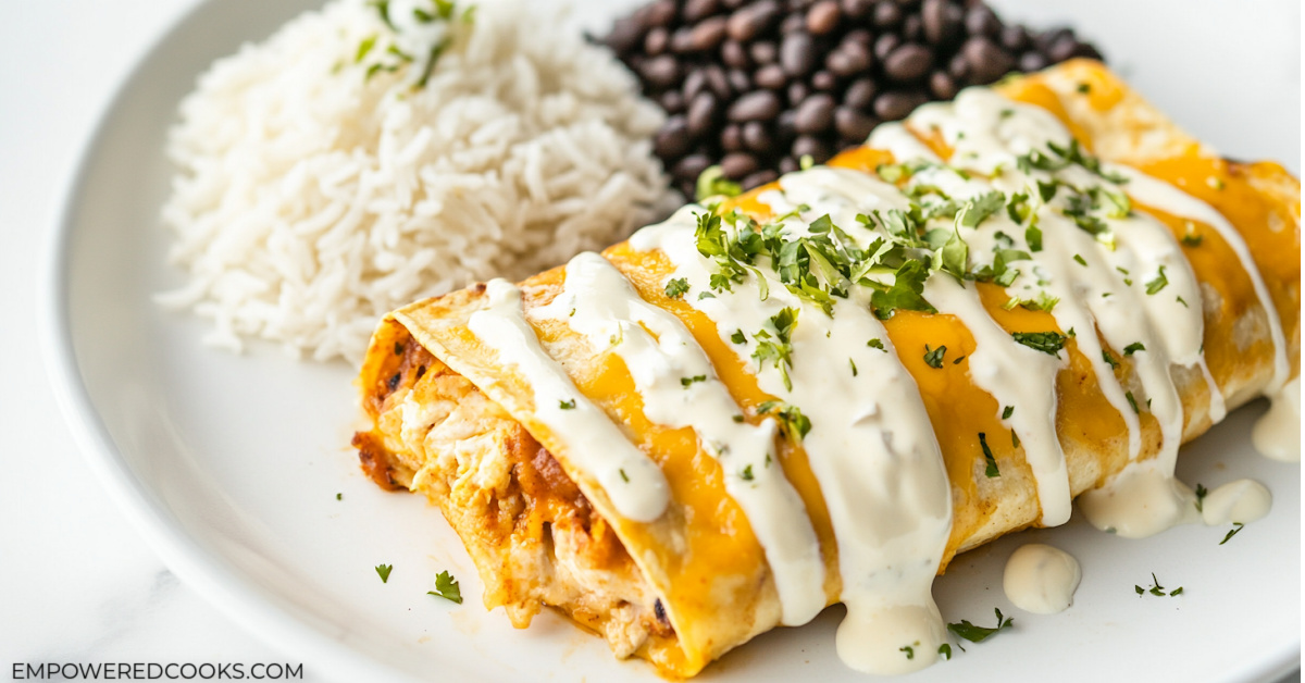 chicken enchiladas with a drizzle of sour cream