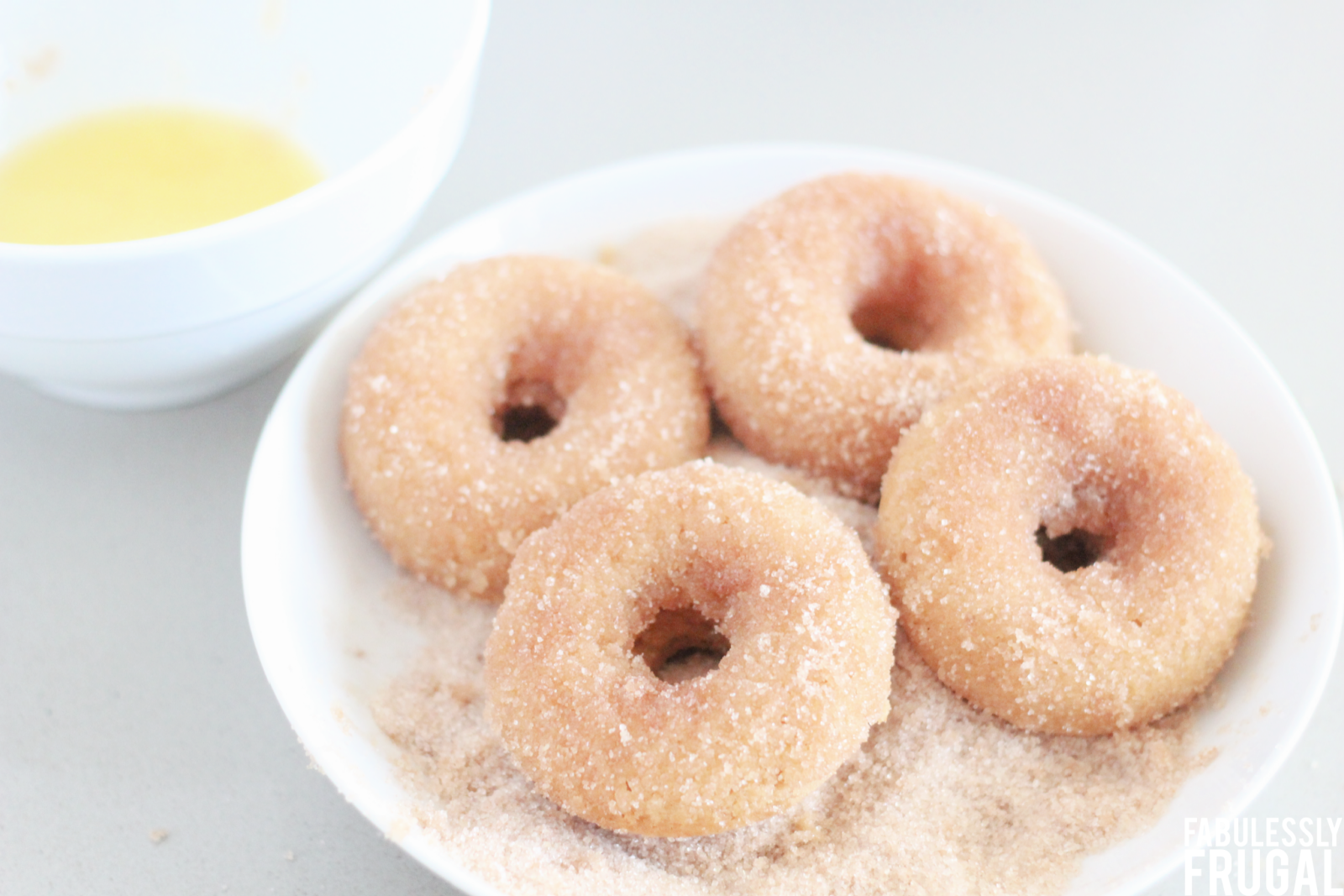 air fryer cake donuts with cinnamon sugar coating