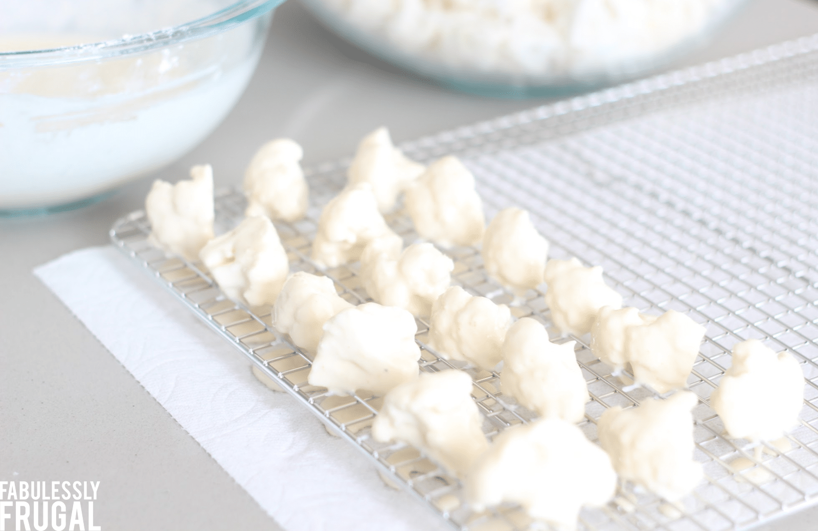 Removing excess batter from cauliflower using wire cooling rack