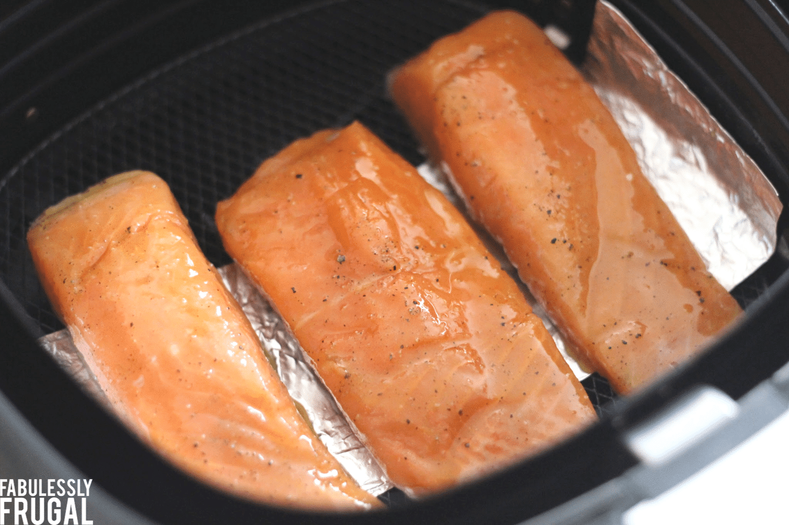 Salmon in air fryer with foil sling