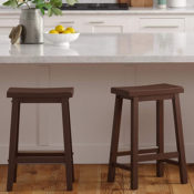 2-Count 24-inch Amazon Basics Solid Wood Walnut Finish Counter Stool $49.50...