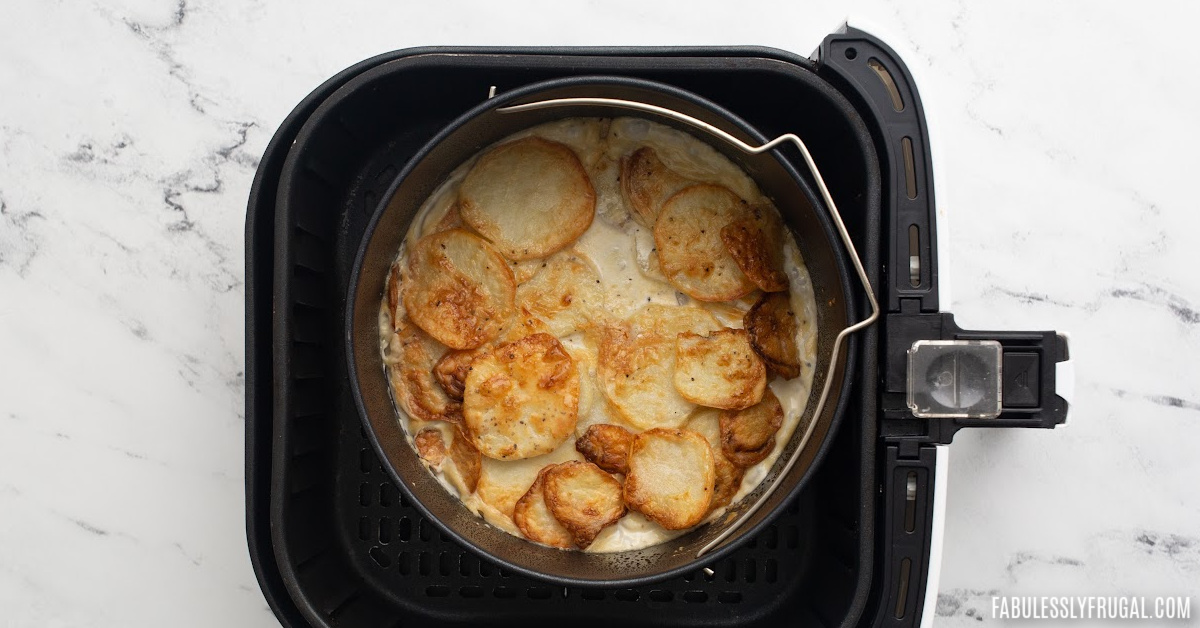 scalloped potatoes in a creamy cheese sauce