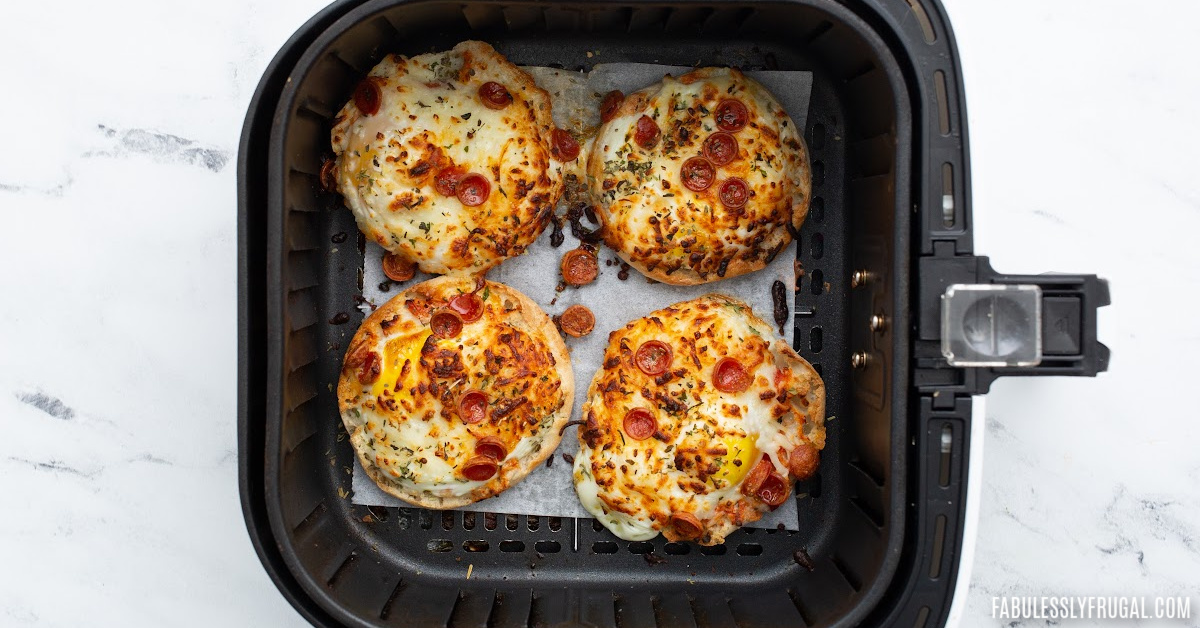 https://fabulesslyfrugal.com/wp-content/uploads/2023/01/air-fryer-mini-breakfast-pizzas-7.jpg