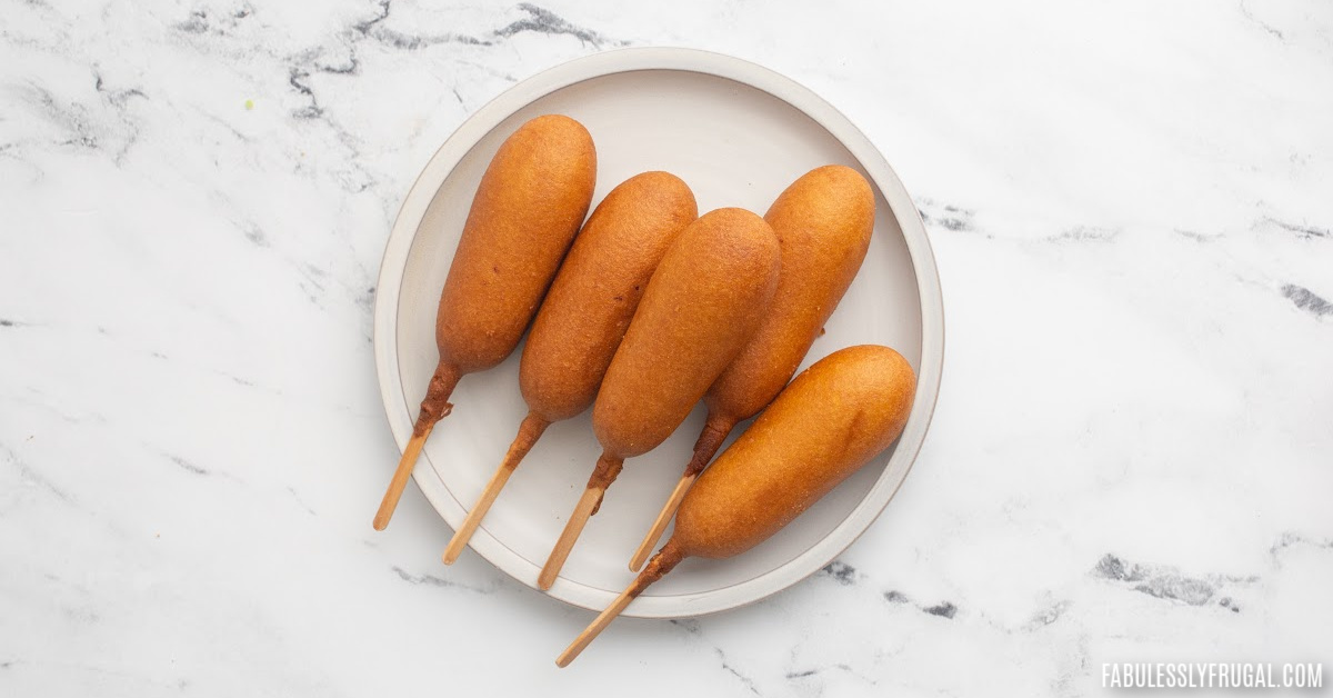 corn dogs on a plate