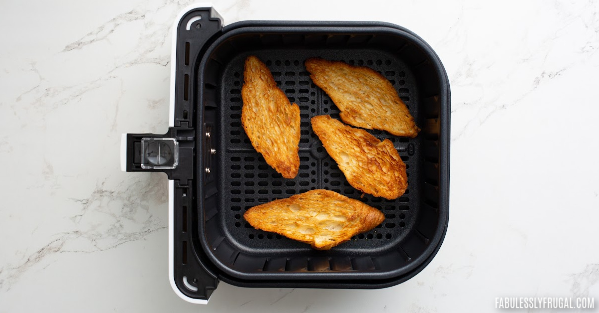 toasted croissant in air fryer basket