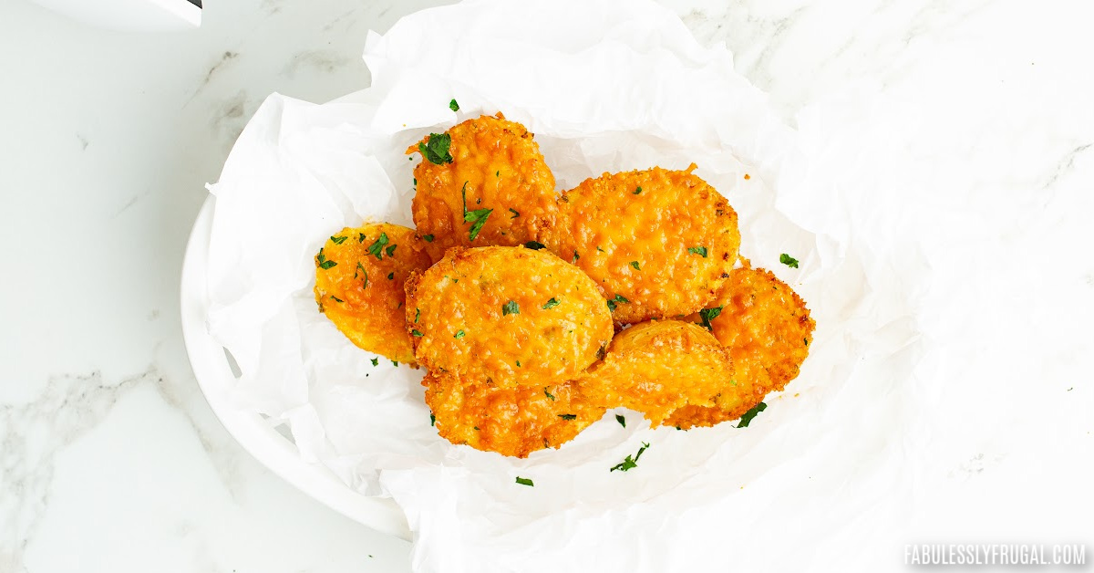 parmesan crusted potatoes on serving platter