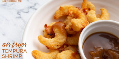 air fryer tempura shrimp on plate with bbq sauce