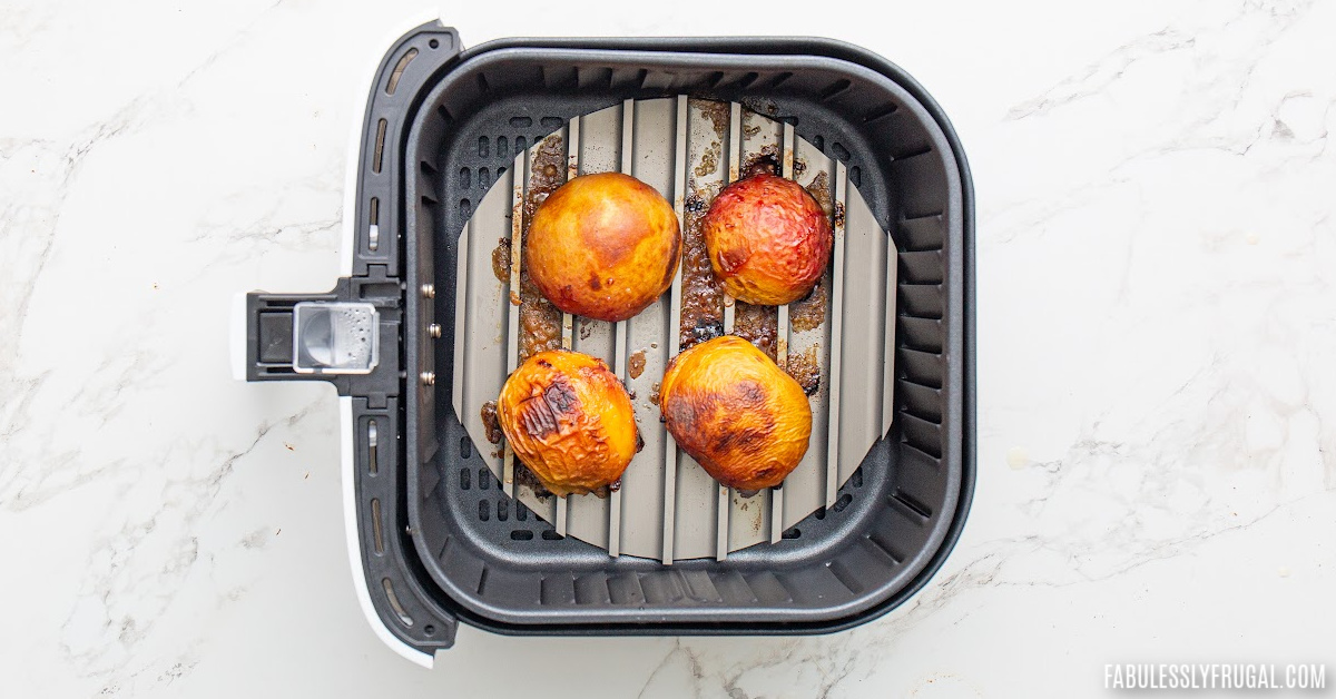grilled peach halves in air fryer basket