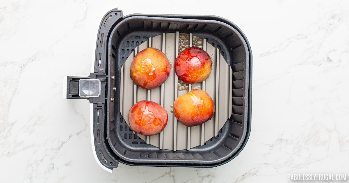 peach halves on air fryer grill grate
