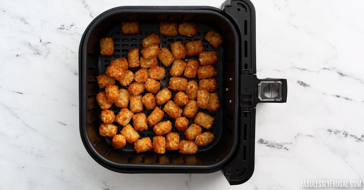 cooked frozen tater tots in air fryer basket