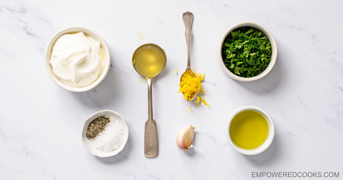 a group of bowls and spoons with ingredients to make yogurt sauce
