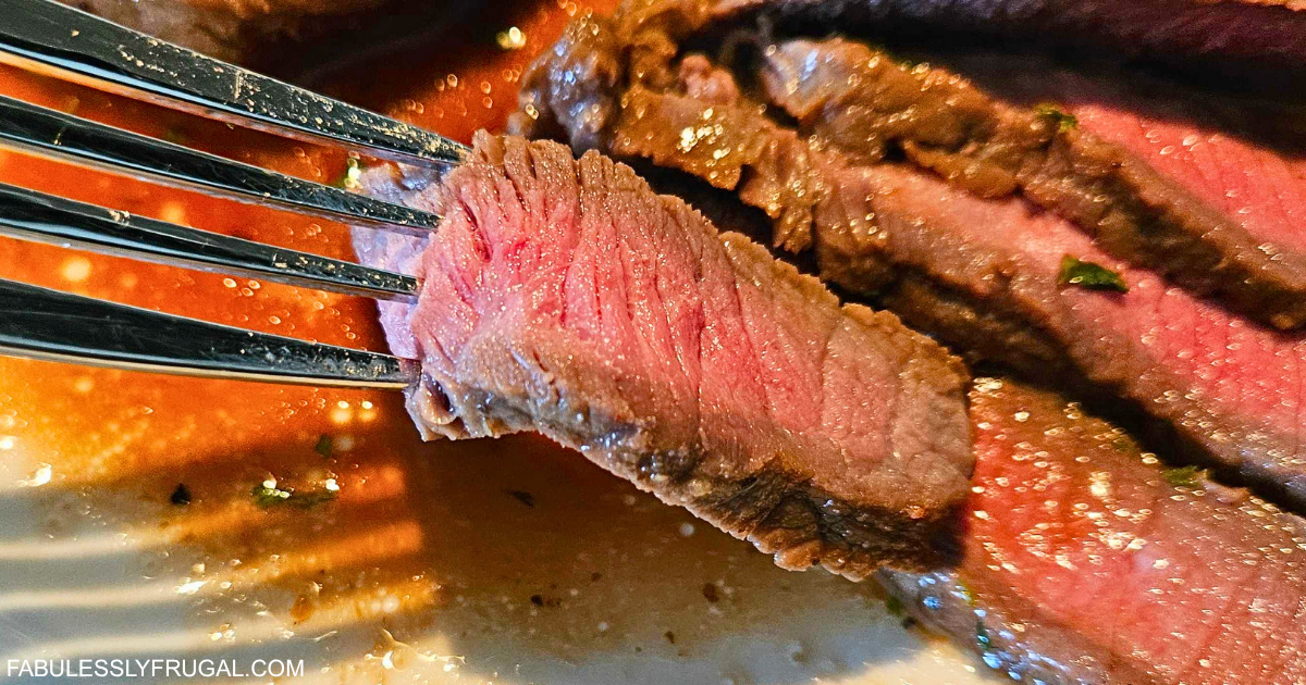 bite of air fryer top sirloin filet on fork