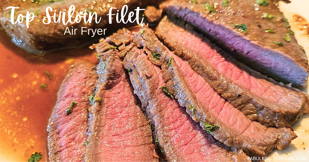 air fryer top sirloin filet sliced medium-rare on plate